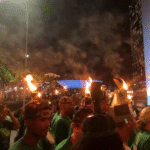 Porongas na cabeça simbolizam resistência na marcha dos povos da floresta em Belém